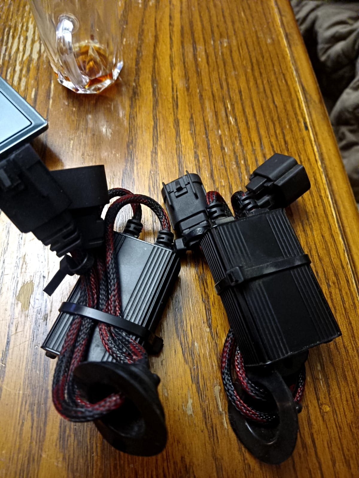 Pair of aftermarket headlight ballasts / LED drivers with wiring harness & rubbe